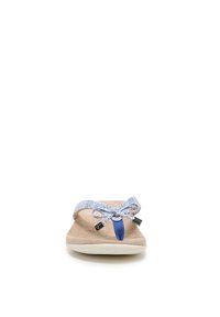 Light brown sandal with a textured footbed, blue patterned strap, and a decorative bow detail. Features a white sole and flat design.