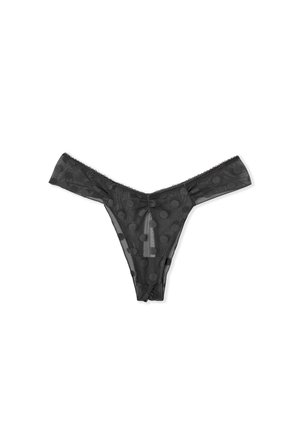 Tanga nero trasparente con motivo a pois, caratterizzato da bordini in pizzo e copertura minimale ai lati per un design delicato.