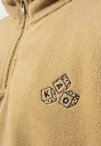 Kaotiko NO RISK UNISEX - Fleece trui - camel