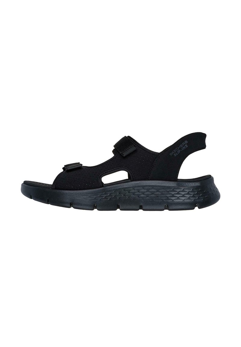 Sandalo nero con tomaia in rete traspirante, cinturini regolabili e suola testurizzata. Presenta ritagli per la ventilazione e una soletta ammortizzata.