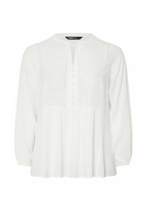 Blusa bianca a maniche lunghe con scollatura rotonda, dettagli in pizzo sul davanti, chiusura con bottoni e vestibilità ampia. Tessuto morbido e strutturato.