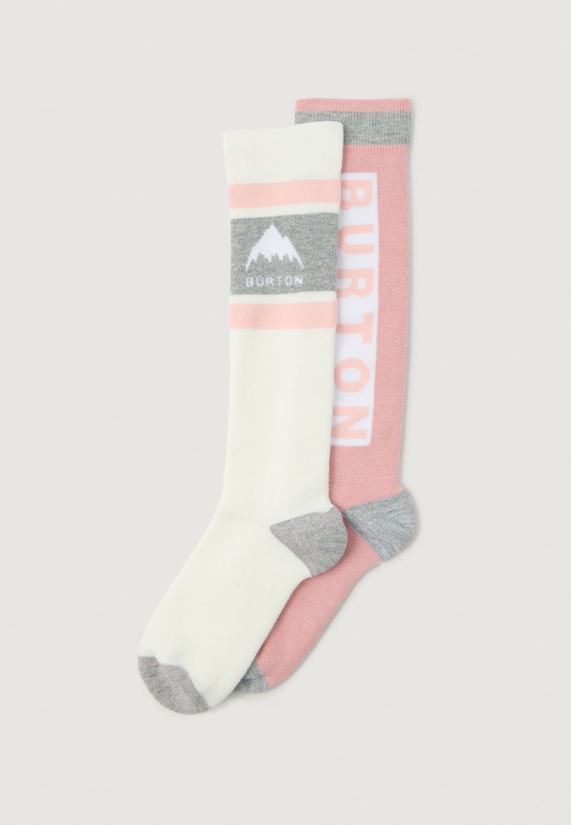 Ponožky po kolená v krémovej a ružovej farbe s šedými akcentmi. Jedna ponožka má logo s horou a pruhy, druhá obsahuje text a jednofarebný design.