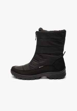 Black mid-calf winter boot with quilted fabric, Gore-Tex tag, side zipper, fur lining, suede heel, and rugged rubber sole.