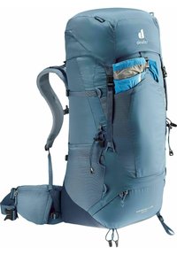 Deuter blue backpack with adjustable shoulder straps, mesh pockets, and side zippers. Features a curved design and durable nylon material.