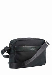 Borsa a tracolla nera realizzata in tessuto durevole con una texture liscia, dotata di chiusura con zip, tracolla regolabile e tasca frontale con logo.