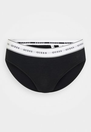 Crne pamučne gaćice s kontrastnim bijelim elastičnim pojasom koji sadrži ponovljeni "GUESS" logo. Mekana tekstura i dizajn standardne veličine.