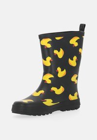 Black rubber rain boot with yellow duck pattern, featuring a textured sole and a pull tab at the back for easy wear.