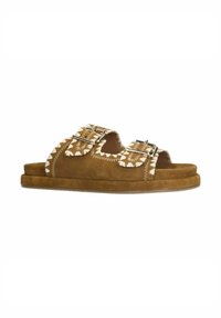 Tan suede slide sandals with two adjustable silver buckles and decorative white stitching along the edges. Flat sole with minimal texture.