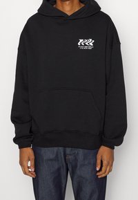 WRSTBHVR Jersey con capucha - black