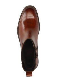 Braune Leder-Ankle-Boots mit glatter Oberfläche, runder Zehenpartie, seitlichem Reißverschluss und strukturiertem Profil. Mit einer Schlaufe zum Anziehen an der Ferse.