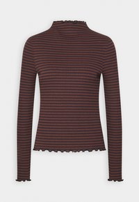 Långärmad topp i mörkbrun med tunna ränder. Har en hög krage och volangkant vid manschetter och nederkant. Tillverkad av en texturerad tyg.