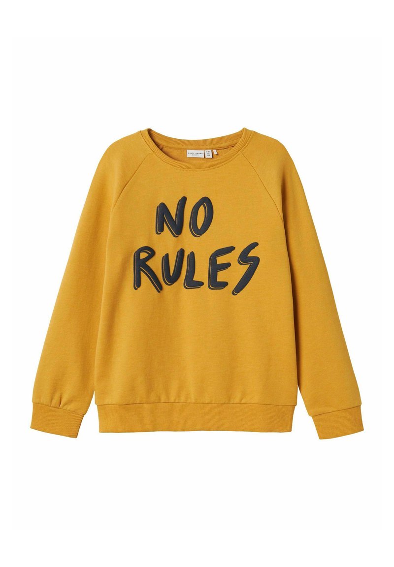 Sudadera amarilla con letras negras que dice "SIN REGLAS", con mangas raglán y cuello redondo ribeteado y puños. 