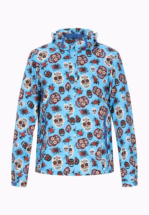 Vaaleansininen takki, jossa on toistuva kuvio luurangoista ja kukista punaisina, mustina ja kermansävyisinä. Sisältää nyörikiinnikkeen hupun ja napin kiinnityksen.