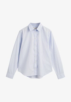 Helesinine puuvillane särk, millel on krae, pikad varrukad, seljaõmblus ja kumer alumine serv ning diskreetne tikandiga logo.