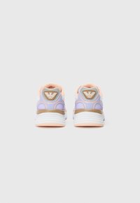 Sport shoes with a lavender and white mesh upper, peach accents, and a textured beige sole. Features logo on the heel and padded collar.