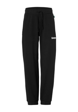 Sorte joggingbukser med snøre, elastiske manchetter og hvidt "Kempa"-logo på den øverste højre lår.