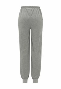 Graue Baumwoll-Jogginghosen mit elastischem Bund und schmal zulaufenden Bündchen, die eine glatte Textur und ein schlichtes Design aufweisen.