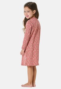 Pink long-sleeve nightgown with a leopard print pattern, made of soft fabric, reaching just above the ankle. Features a round neckline.