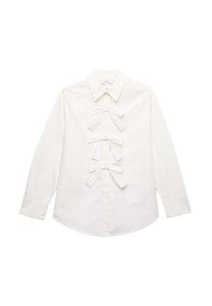 Wit katoenen overhemd met knopen, met een gladde textuur, een gebogen zoom en lange mouwen met knoopmanchetten.