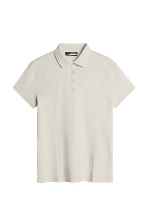 Beige Poloshirt mit klassischem Kragen, kurzen Ärmeln und einer Knopfleiste mit fünf Knöpfen. Mit strukturierten Schulterakzenten und einem kleinen Logo.