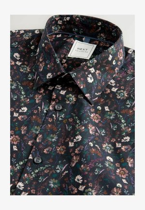 Camicia nera a fiori con fiori multicolori; presenta un colletto a punta, chiusure a bottoni e un tessuto liscio e testurizzato. Etichetta: NEXT Tailoring.