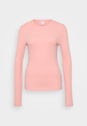 Camisa de manga longa em rosa claro, com decote redondo e silhueta ajustada, em tecido suave e texturado.