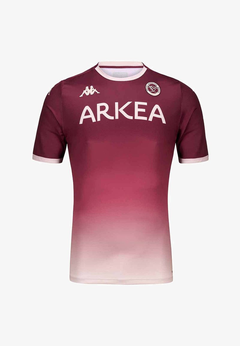 Maillot de sport à dégradé bordeaux vers rose clair avec le logo ARKEA, le logo de la marque Kappa et un écusson circulaire de l'équipe sur la poitrine.