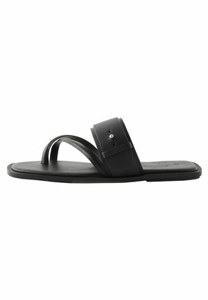 Mustad mustad sandaalid minimalistliku disainiga, millel on kaks ristuvat rihma ja lai pahkluu rihm koos klõpsuga. Siledat tekstuuri, kummist talla.