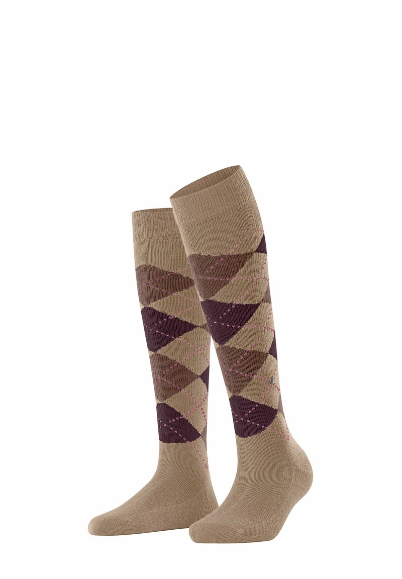 Calze al ginocchio di colore beige con un motivo a diamante nei toni del marrone e del rosa. La calza destra è leggermente in avanti.