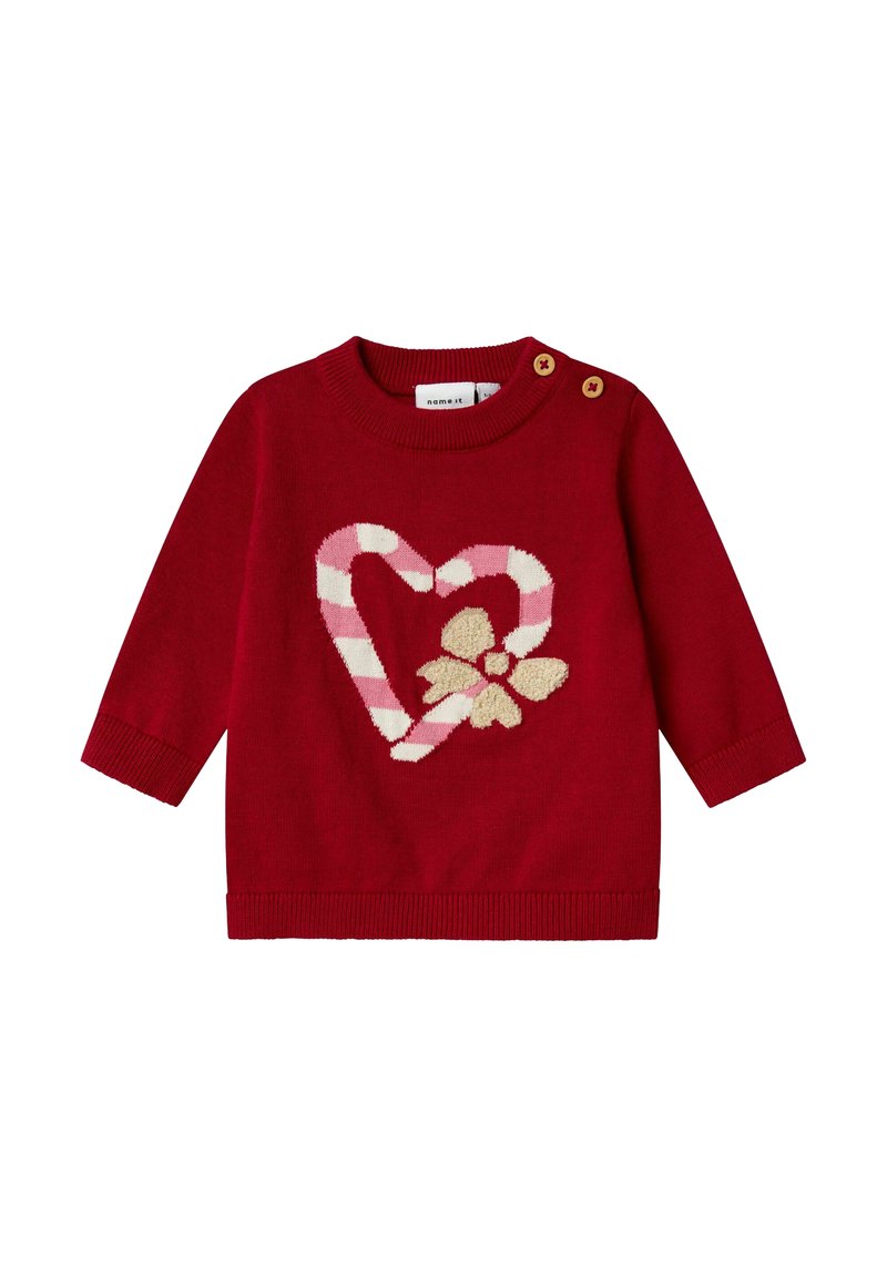 Maglione per bebè a maniche lunghe rosso con cuore a strisce a forma di bastoncino di zucchero e design con fiocco beige, dotato di due bottoni in legno sulla spalla.