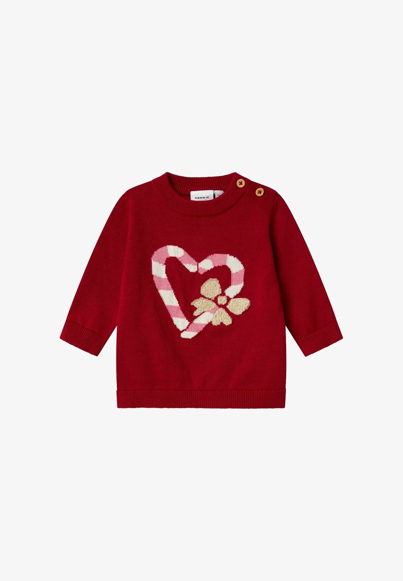 Maglione per bebè a maniche lunghe rosso con cuore a strisce a forma di bastoncino di zucchero e design con fiocco beige, dotato di due bottoni in legno sulla spalla.