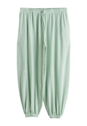 Next, REGULAR FIT - WASHED BLUE JERSEY BALLOON TROUSERS . - Pantalones deportivos - sage green