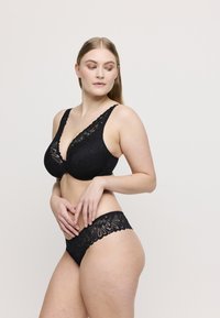 PrimaDonna TWIST RUPI HALF PADDED PLUNGE - Kaarituettomat rintaliivit - black