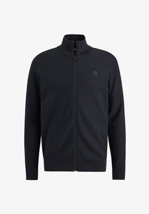 Dunkelblaues Zip-Up-Jacke mit hohem Kragen, gerippten Bündchen und Saum, aus einem strukturierten Stoff und mit einem kleinen quadratischen Logo auf der Brust.