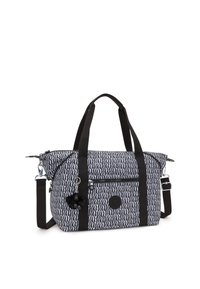 Borsa in tessuto a righe bianche e nere con doppi manici, tracolla regolabile e tasca frontale con zipper. Presenta un accessorio pom-pom.