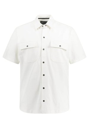 Kortærmet hvid skjorte lavet af bomuld med nedknappet krave, to brystlommer og sorte trykknapper. Glat tekstur og tætsiddende pasform.