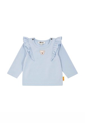 Hellblaues Langarmshirt mit Rüschenschuldeteilen, ausgestattet mit einer Bärenapplikation auf der Vorderseite und Druckknöpfen am Kragen.