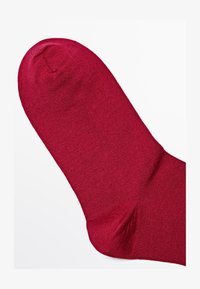 Selezionato, red