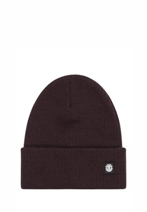 Brown knitted beanie with a folded cuff and a small black logo patch. The texture is ribbed and soft, featuring a seamless top.