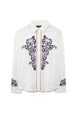 Camisa blanca de manga larga con bordado de cachemira en rojo y azul marino en el frente y las mangas. Presenta cuello de pico y cierre de botones.