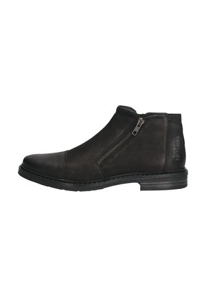 Schwarze Leder-Stiefeletten mit seitlichem Reißverschluss, runder Spitze und strukturiertem Obermaterial. Sie besitzen einen niedrigen Blockabsatz und kontrastierende Nähte.
