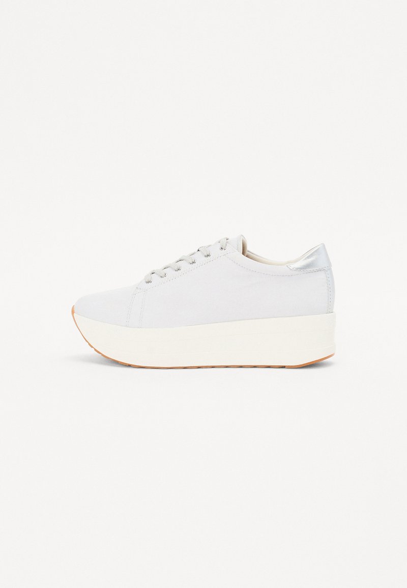 Light gray sneaker with a platform sole. Features a smooth fabric upper, round toe, and silver accents at the heel and eyelets.
