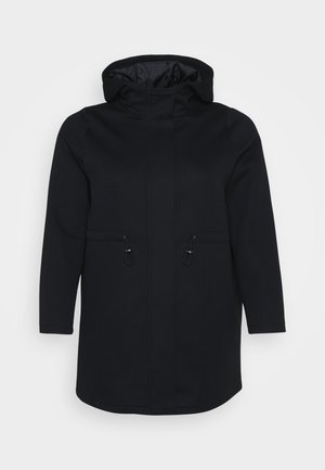 Black hooded coat featuring long sleeves, two front pockets with drawstring closures, and a smooth inner lining. Straight cut design.