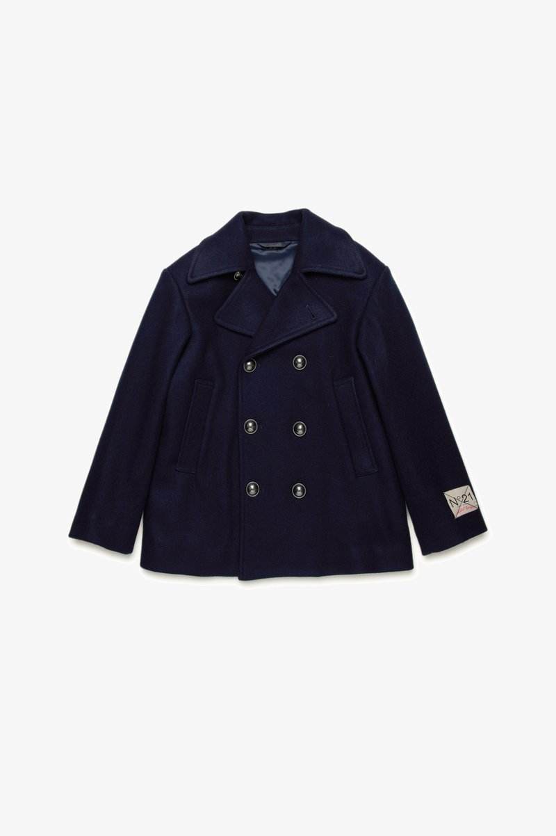 Navy wool peacoat with double-breasted design, large lapels, and black buttons. Features two side pockets and a tag on the sleeve.