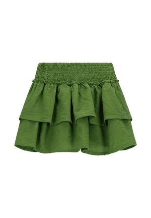 Jupe verte en tissu léger, à plusieurs niveaux, avec une taille smockée. Elle arbore des volants ondulés et une texture froncée.