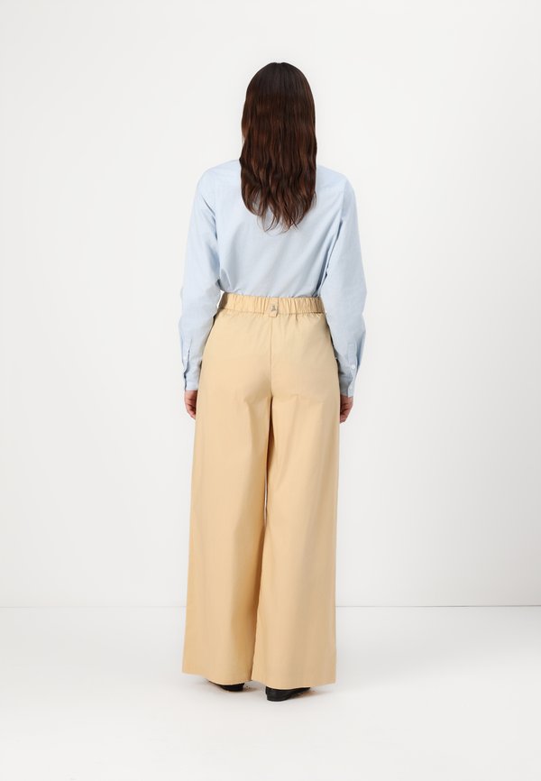 PANTALONI - Trousers - vibrant beige3