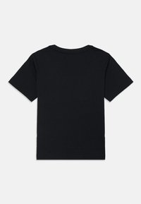 T-shirt en coton noir à manches courtes, avec un col rond et un dos uni sans embellissements ni motifs.