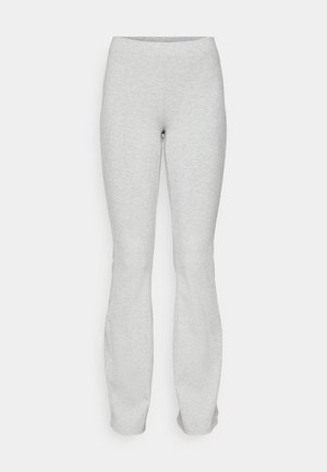 Gray, stretchy leggings with a fitted waist, flared bottom, and subtle texture. No visible hardware or patterns. Simple and streamlined design.