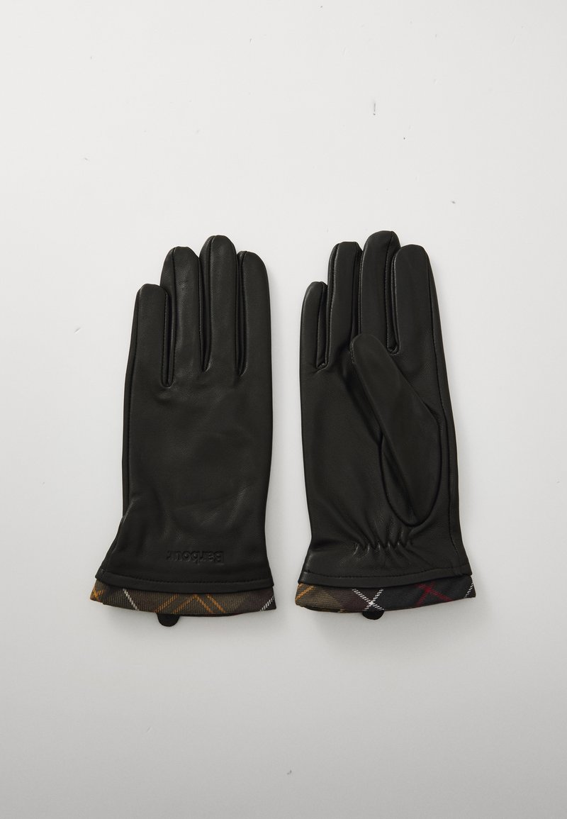 Luvas de couro pretas com punho franzido. Os punhos apresentam um tecido estampado em tons de castanho, amarelo e vermelho. Logotipo da marca em destaque no punho.