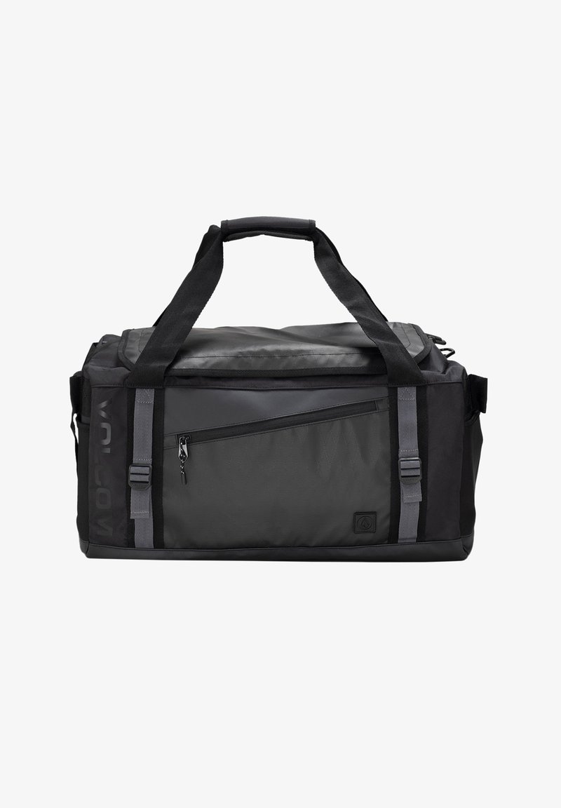 Sac de sport noir en tissu durable, avec une poche frontale zippée, des poignées doubles et une bandoulière ajustable. Accents texturés inclus.
